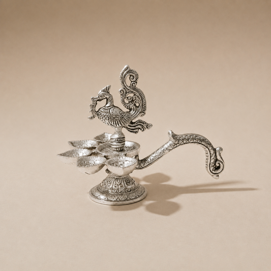 Silver Peacock Panchmukhi Diya with Decorative Handle